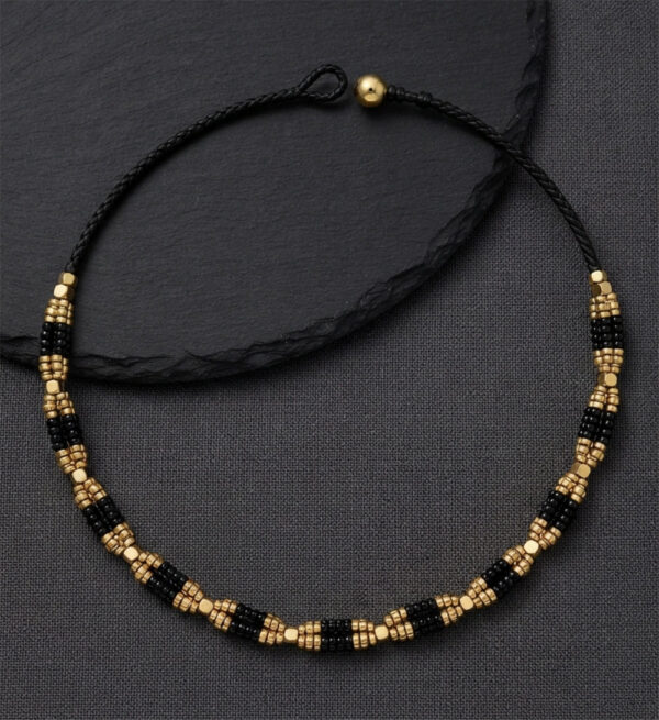 Dhokra Necklace with Stripes of Black and Golden Colour Beads