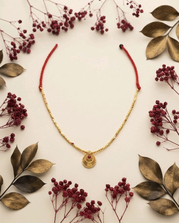 Handcrafted and Traditional Gold Toned Necklace