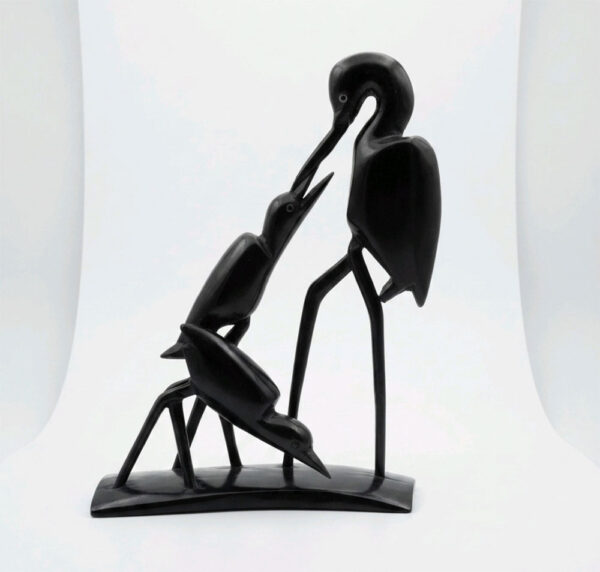 Crane Bird with Two Baby Birds